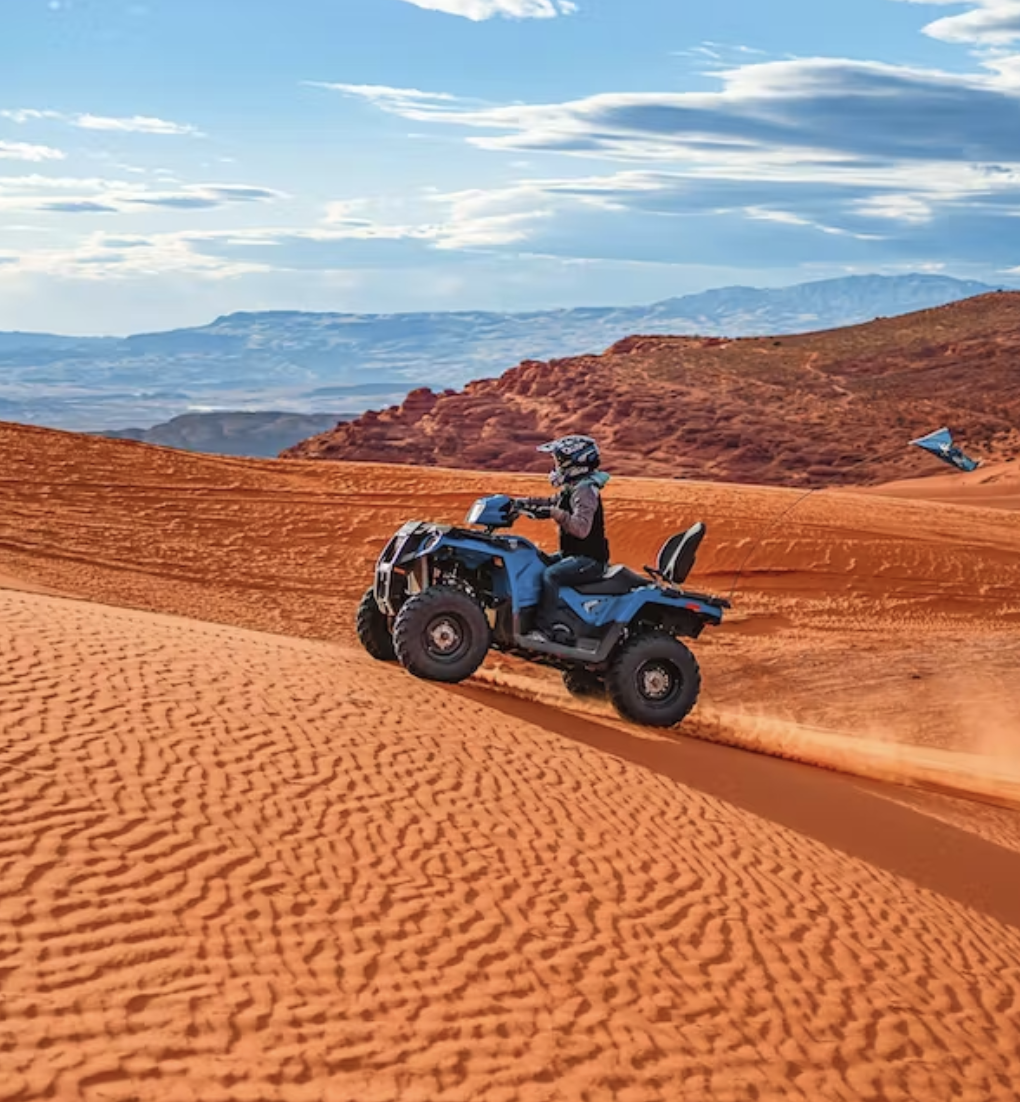 a motorcycle is parked on the side of a mountain