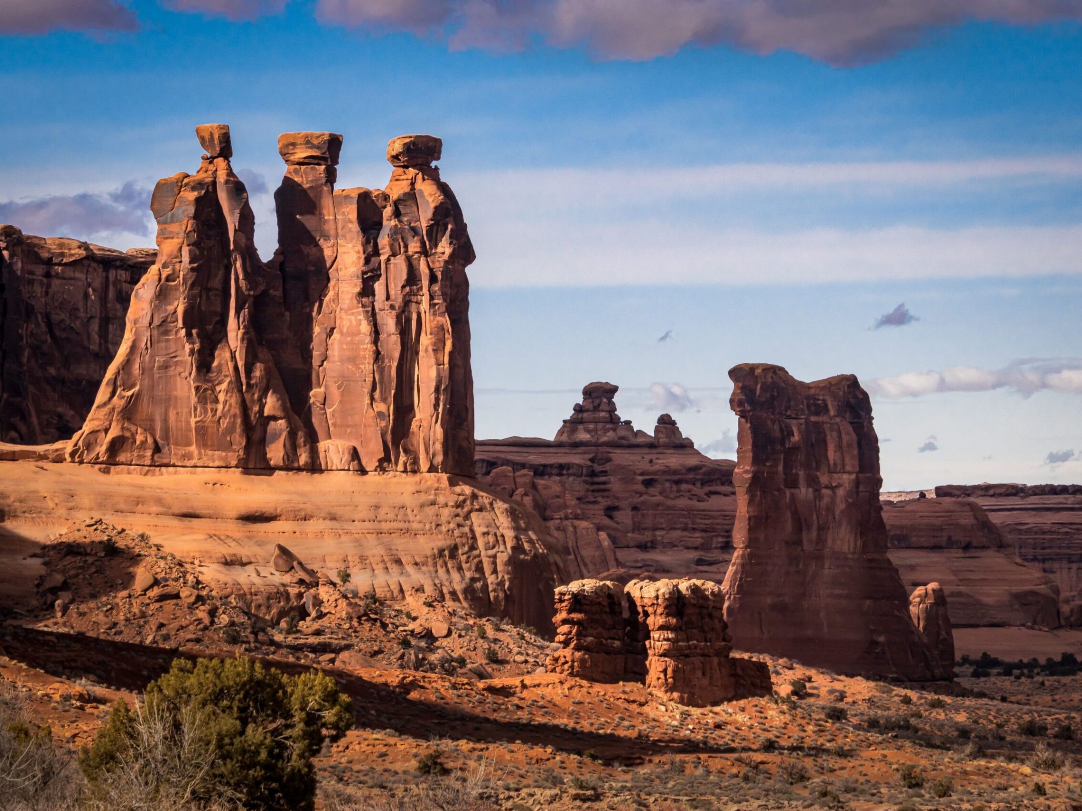 a canyon with Arches National Park in the background