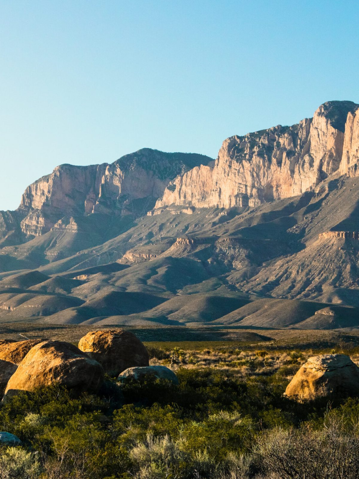 a large mountain in the background