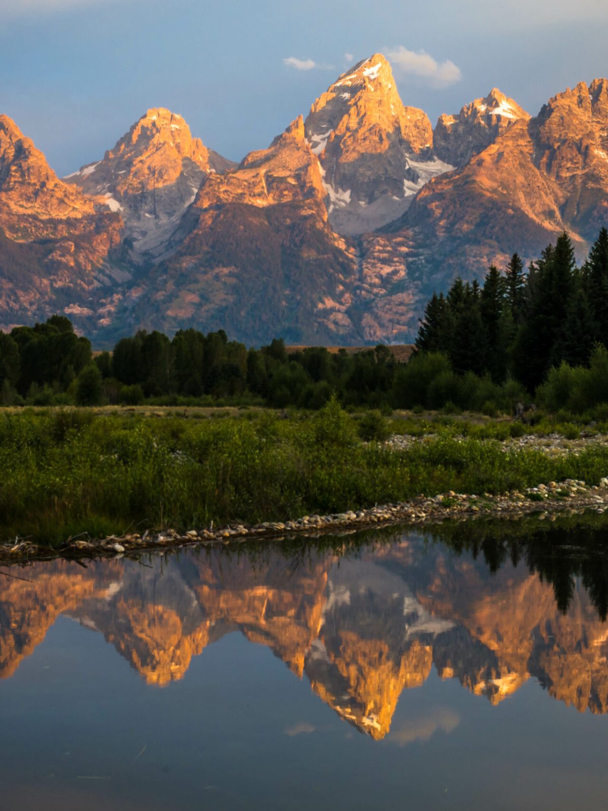 a lake with a mountain in the background