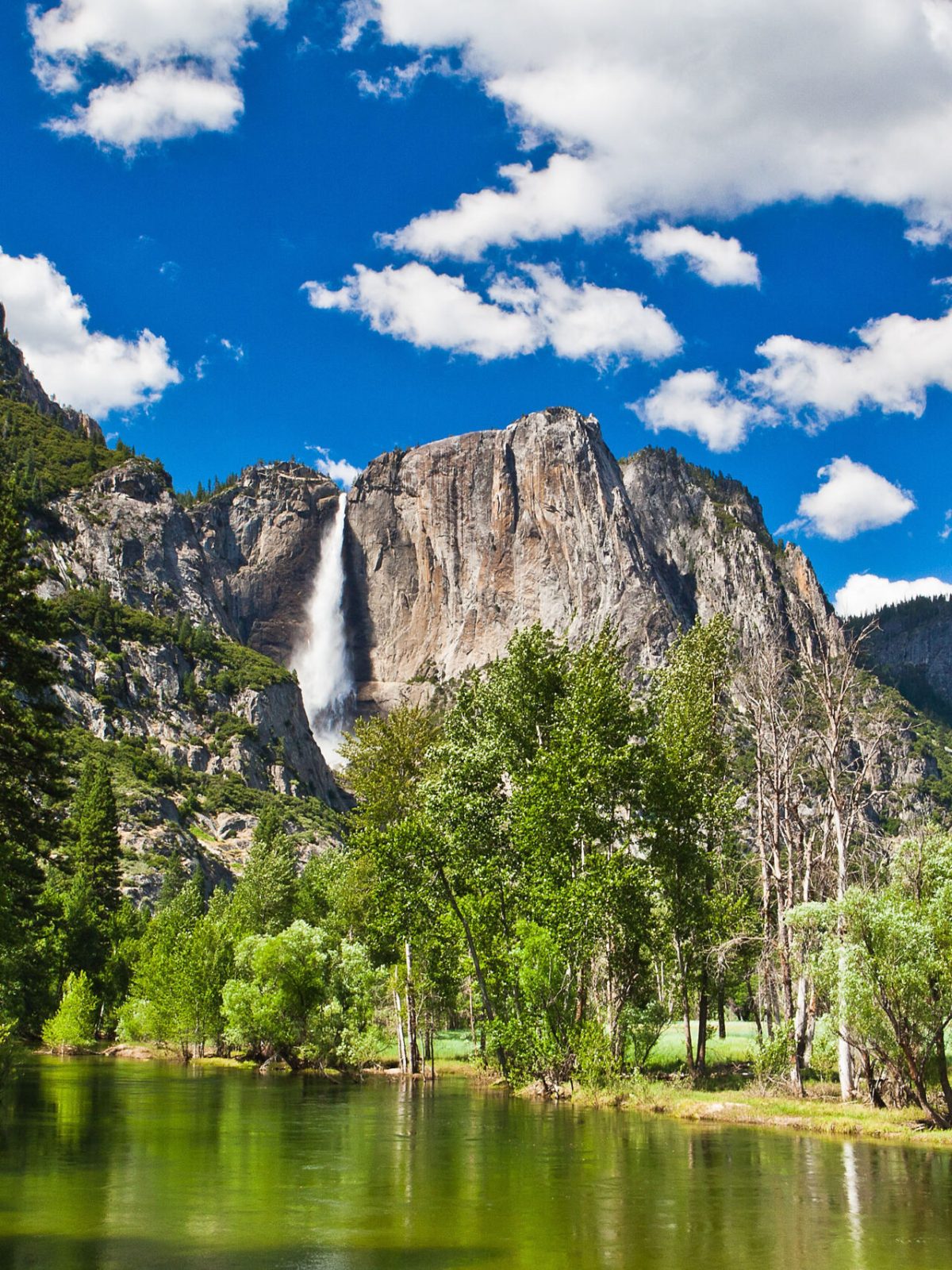 a lake with a mountain in the background